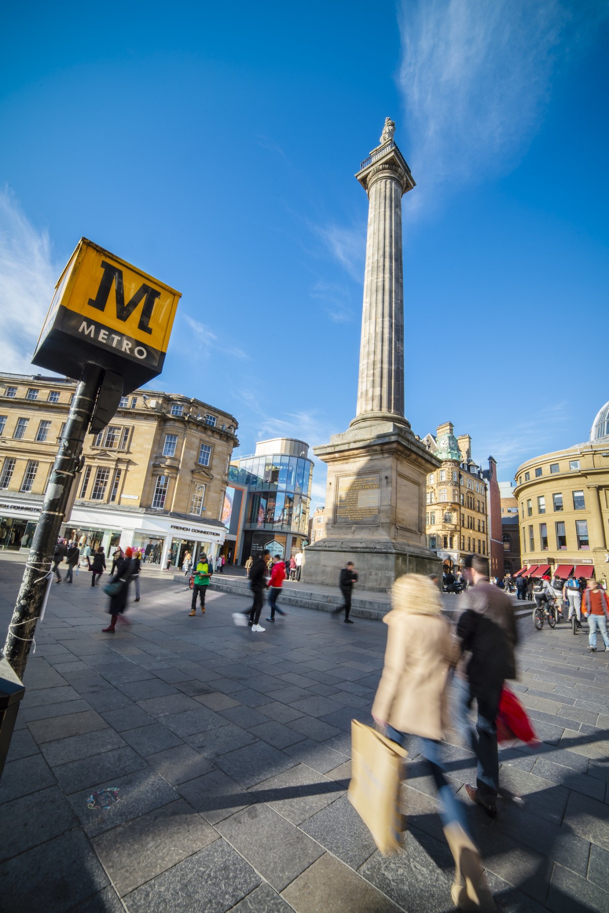 Shopping beside Grey's Monument, (C) Newcastle Gateshead Initiative, Public Domain image